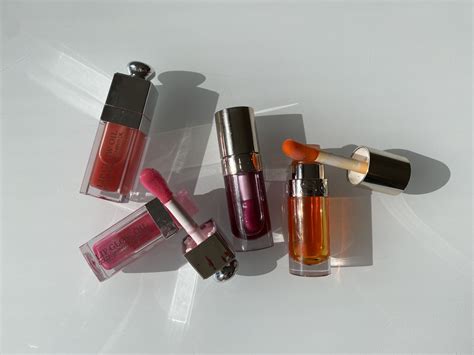 dior lip glow oil vs clarins|dior lipstick refill reviews.